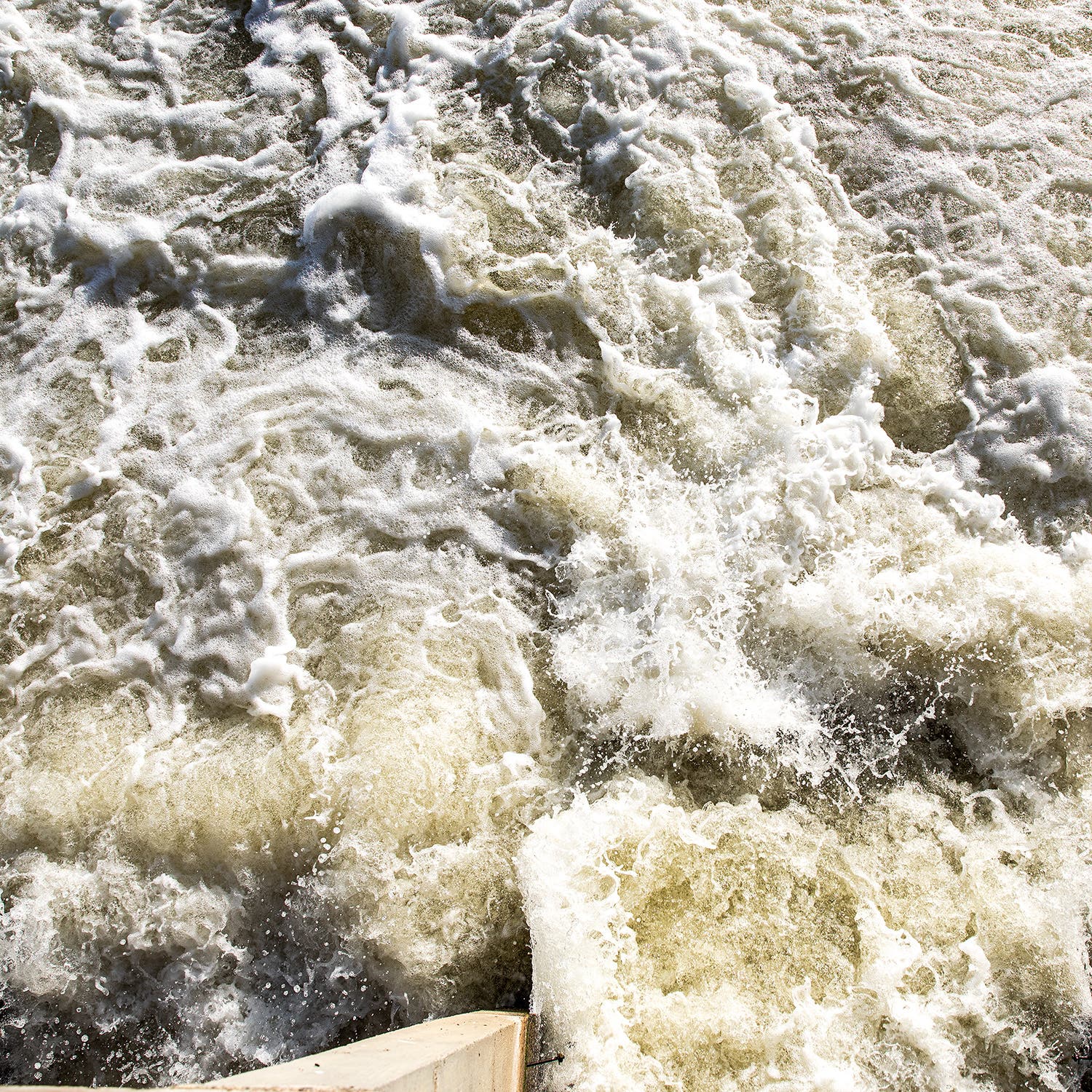 Floodwaters pour out of a dam on the Kings River