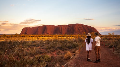 Uluru towers above the surrounding landscape in Australia