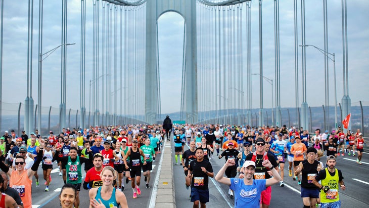 Marathoners cross a big bridge in New York City