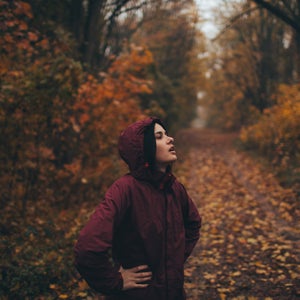 Young woman having a rest from the jogging