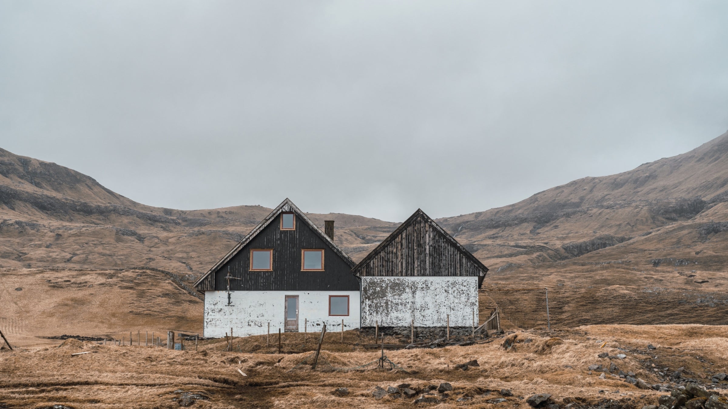 rural house against a cloudy sky