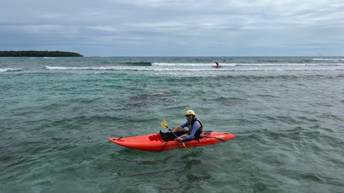 The author’s daughter Pippa in 2022, paddling on Long Caye