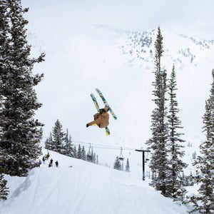Pro skier Tom Wallish gets air on the Line Bacon 122 TWall limited edition skis