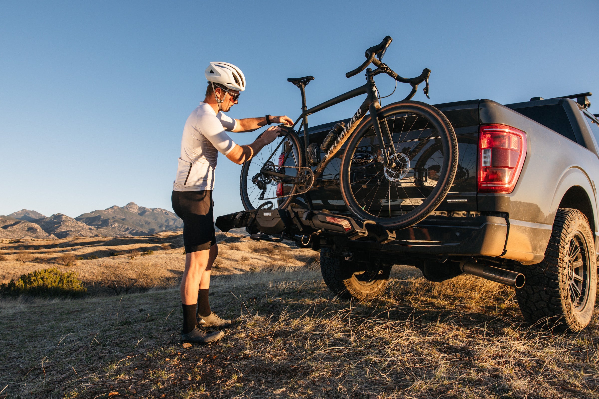 Putting bike on thule 2024 rack