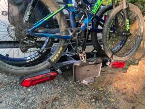 Closeup of bikes secured to Thule Epos 2 bike rack