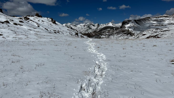 Footprints going off toward peaks.