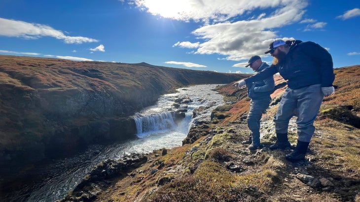 scounting for fish above waterfalls at Deplar Farm Iceland