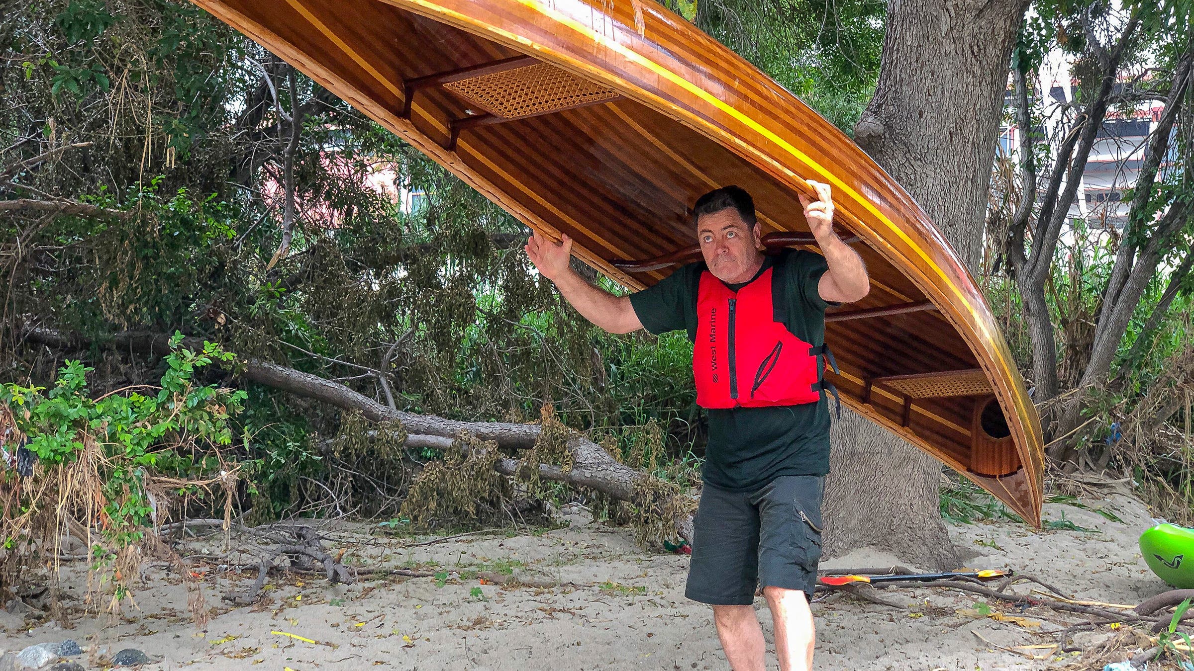 Carrying the canoe to the Elysian Valley put-in.