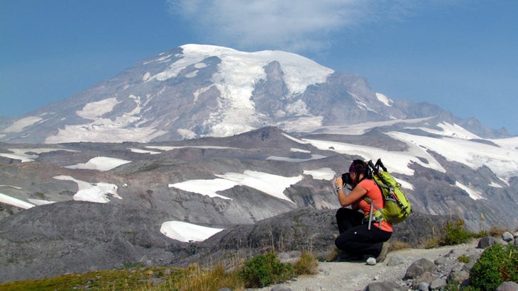 backpacker photographic Paradise Glacier, Wonderland Trail, Mount Rainier National Park