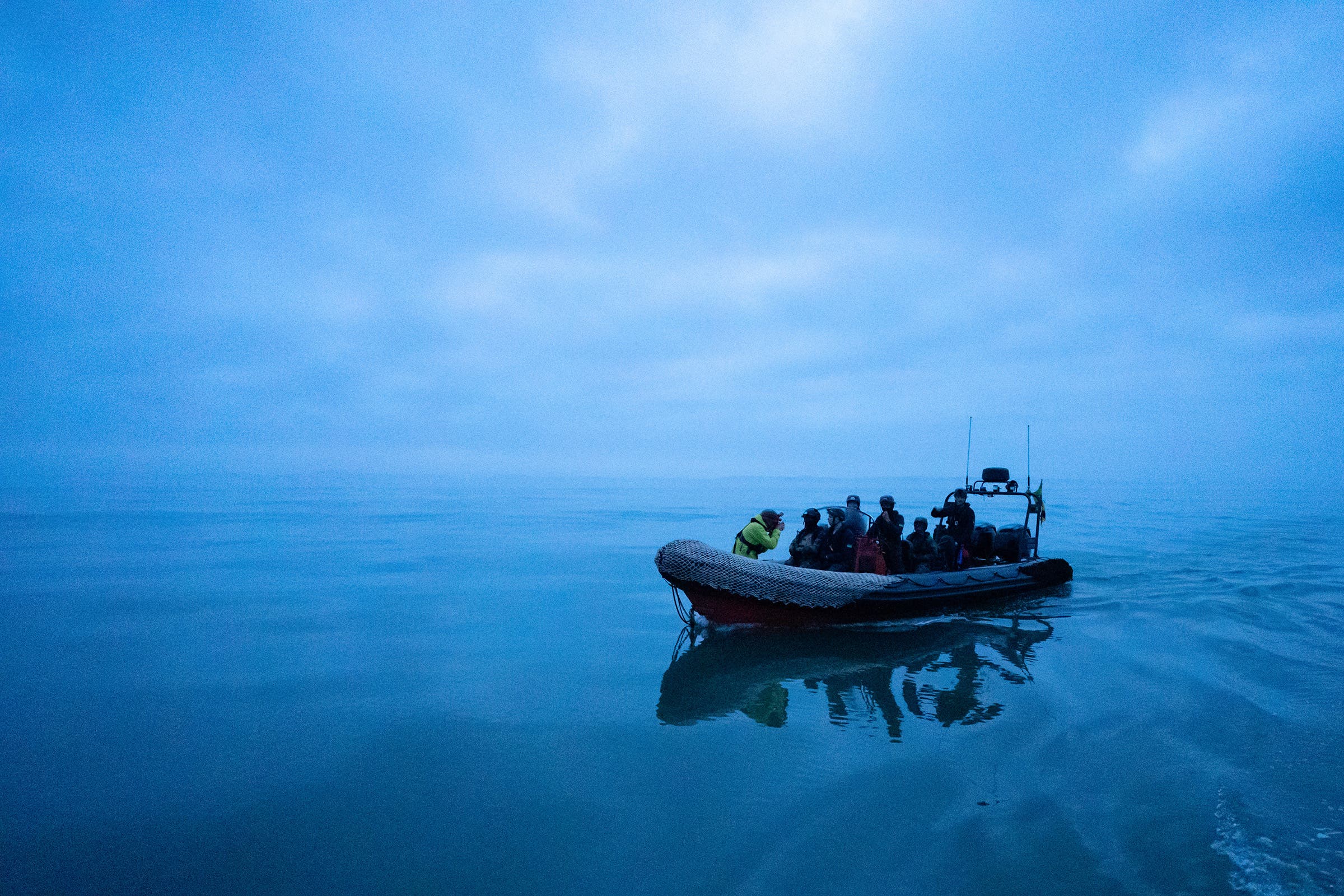 Spitfire on a calm ocean in the early morning