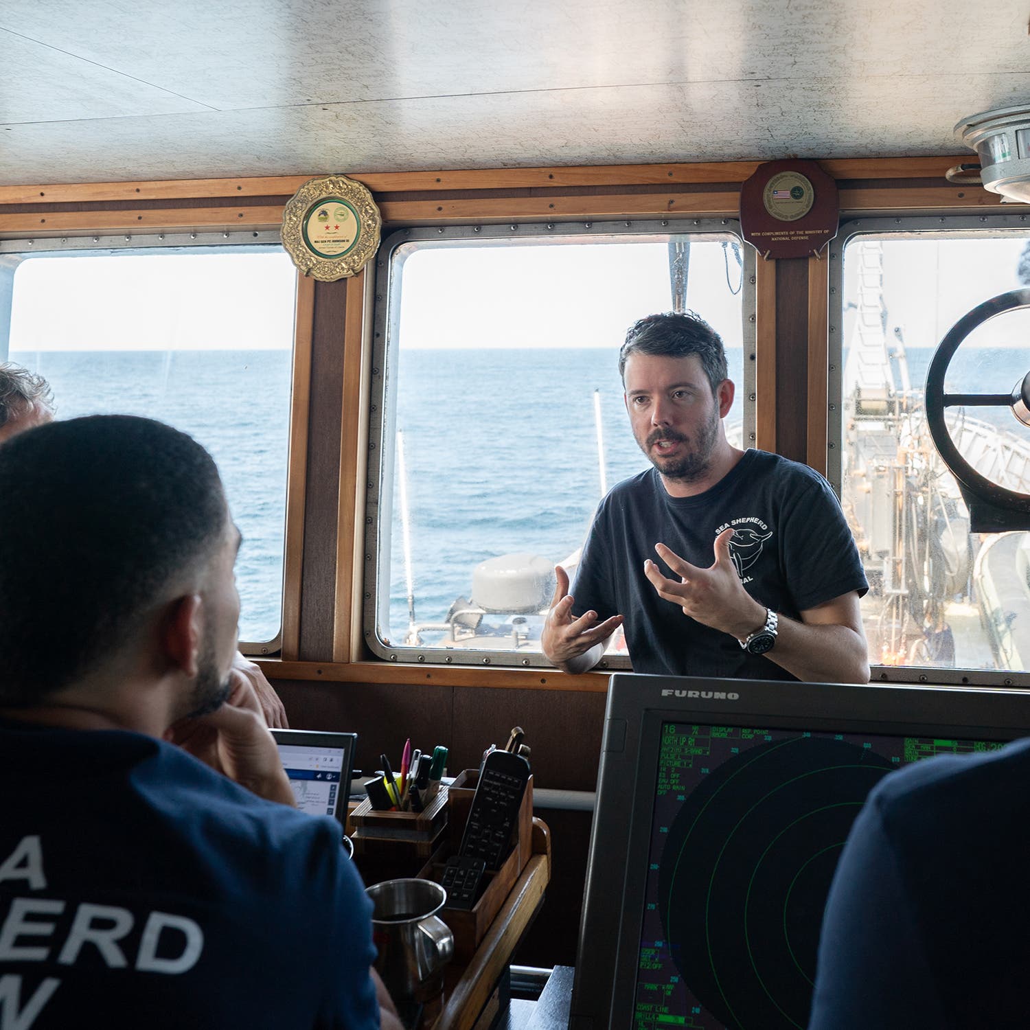 Peter talking at morning bridge meeting