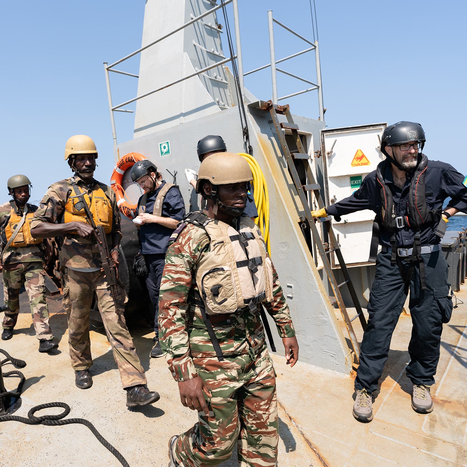 The Navy gets ready to board the small boat