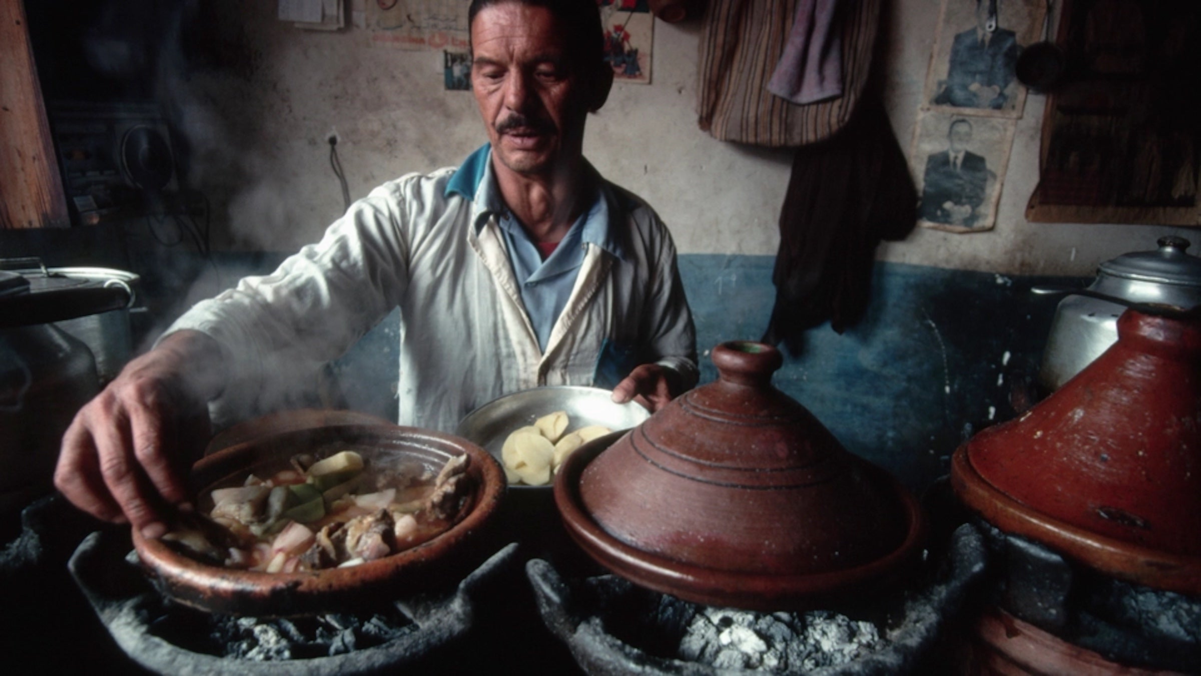 A man prepares Moroccan food