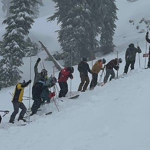 Rescuers probe for survivors after a deadly avalanche at Palisades Tahoe.