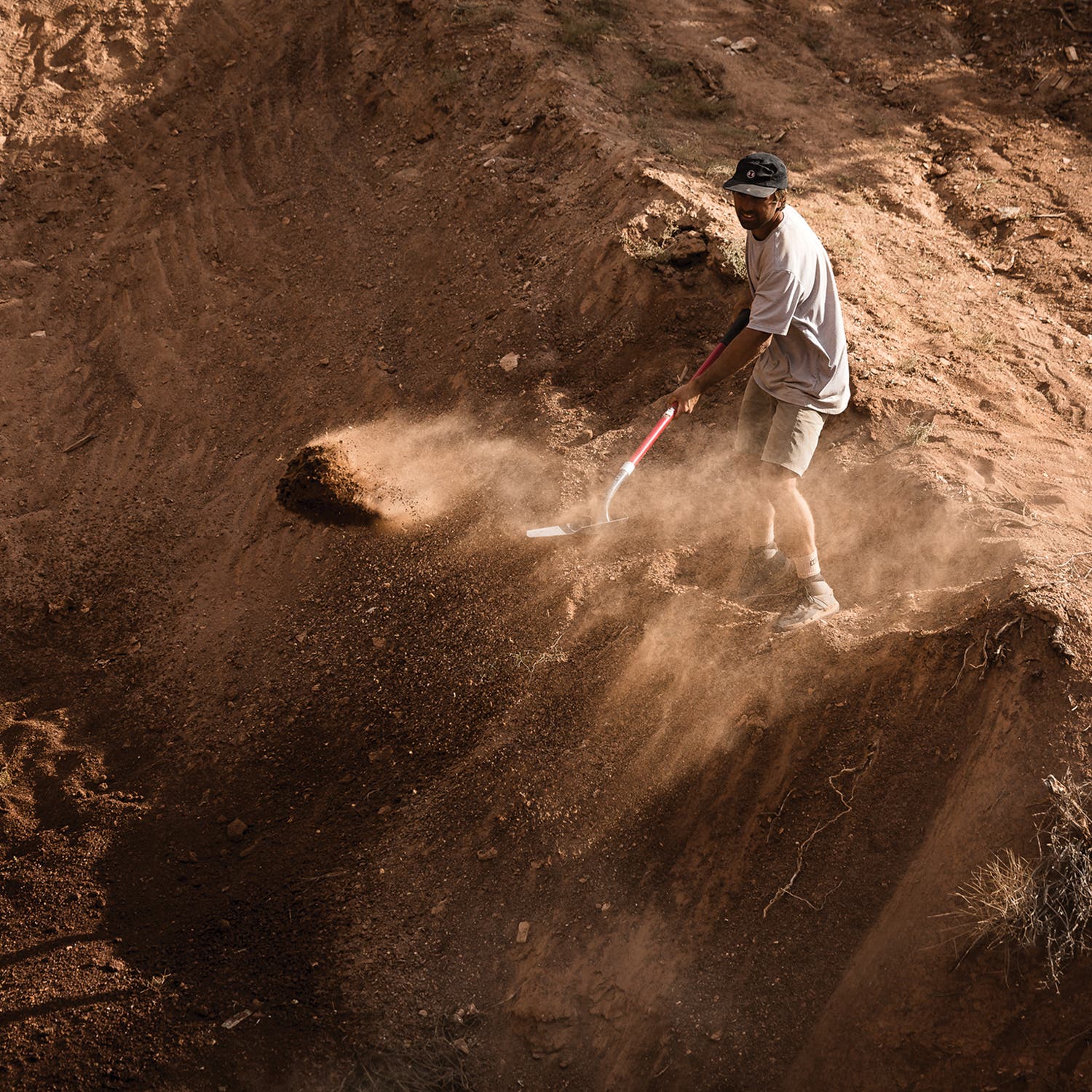Rampage participant digging a line