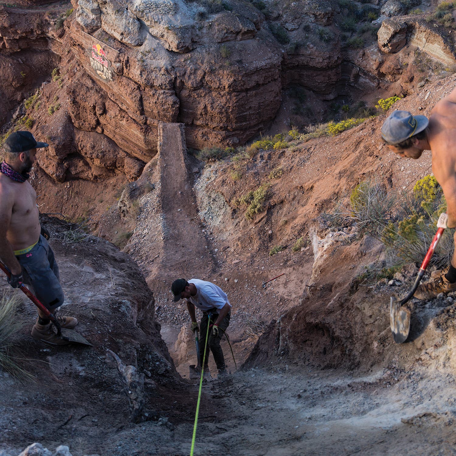 Rider Brendan Fairclough (center) preps his line with his team.