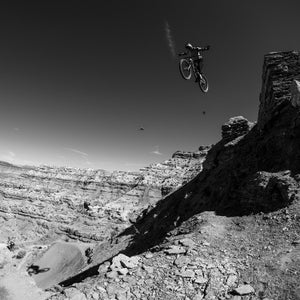 Belgian rider Thomas Genon does a suicide no-hander off a massive step-down at the 2023 Rampage.