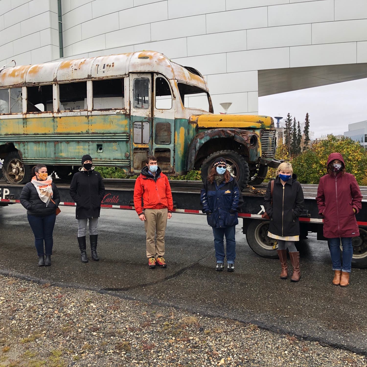 University of Alaska Fairbanks and state officials pose in front of the bus at the Museum of the North in September 2020.