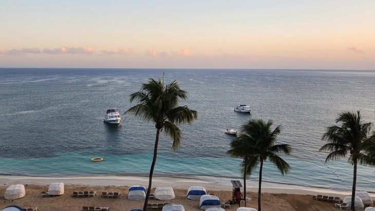 Two tour boats at dusk are moored off Ocho Rios, Jamaica, awaiting the next day's passengers.