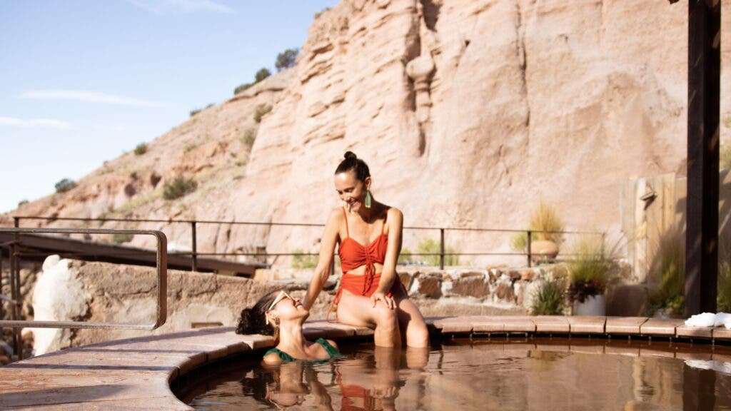 Two female bathers sitting in one of the pools at the Ojo Caliente resort in northern New Mexico.