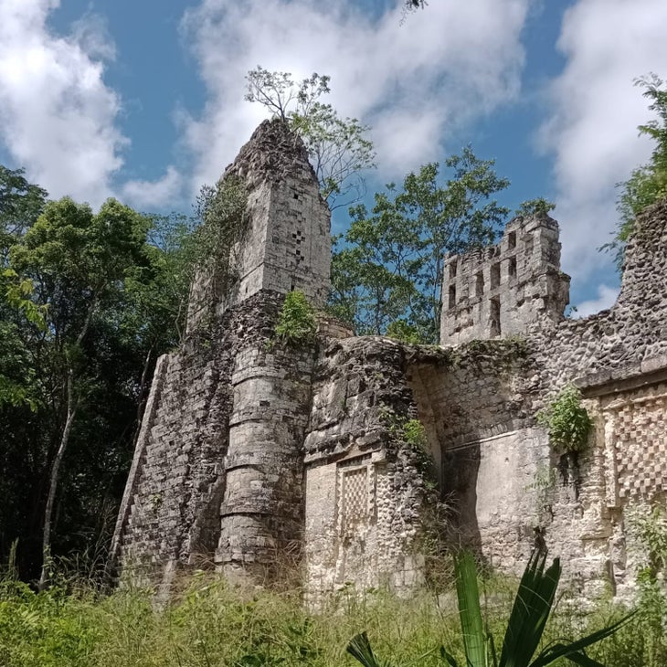 Rio Bec, a Maya city deep in the jungle of the Calakmul Biosphere Reserve. that gets a fraction of visitors. The ruins are so remote, and the jungle so dense, that an entire section of the structures was lost for more than 60 years after the original site discovery in 1912. Put in the extra effort (see below) to come here and you’ll likely have the site to yourself as you climb the steps of stone pyramids stretching 50 feet high built around 700 A.D. Some of the buildings have crumbled, while others still boast the skyward-reaching twin towers indicative of the Rio Bec architectural style,