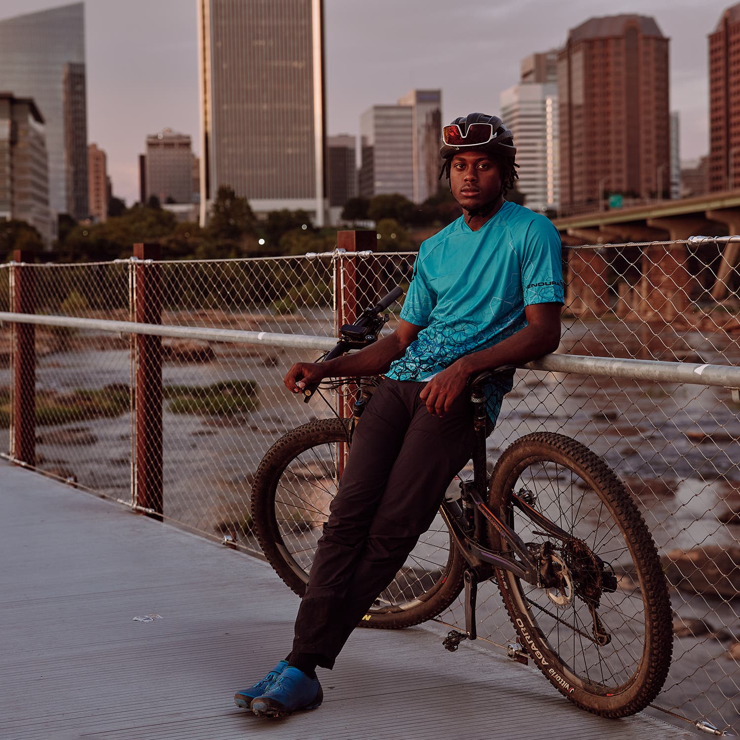 Korey taking a midride break near the downtown high-rises