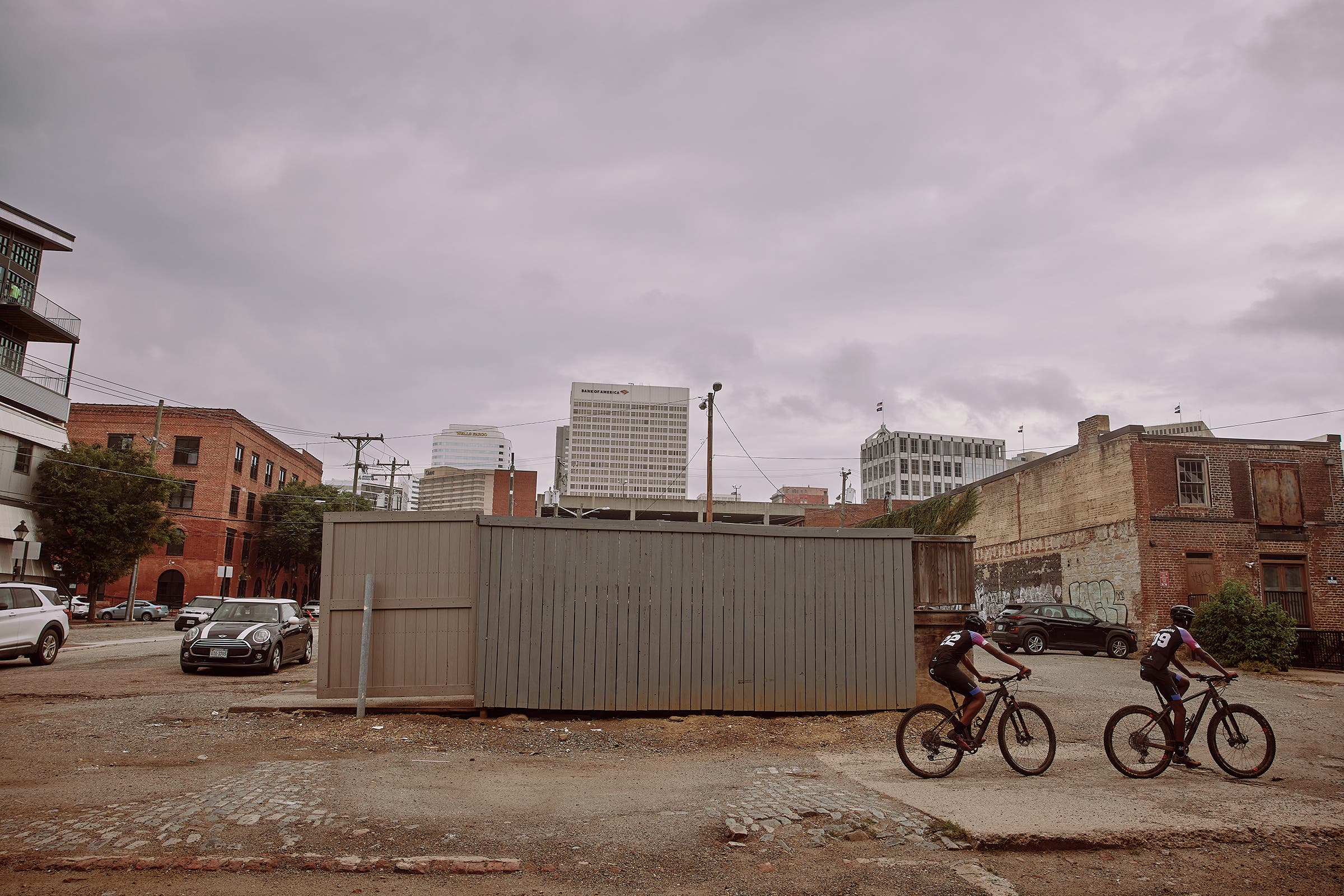 Chip (left) and Naz ride in the alley behind the Richmond Cycling Corps headquarters in Virginia’s capital.