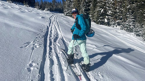 Lisa Jhung climbing a run on her new splitboard