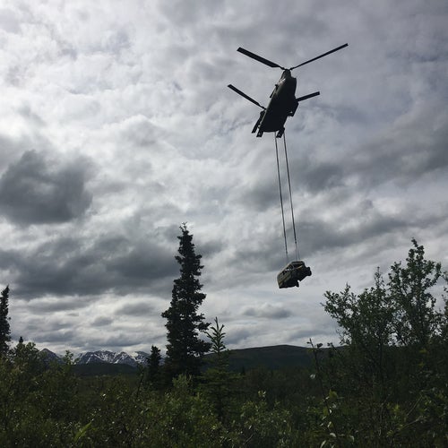 The Alaska Army National Guard transports Bus 142 out of the backcountry in June 2020.