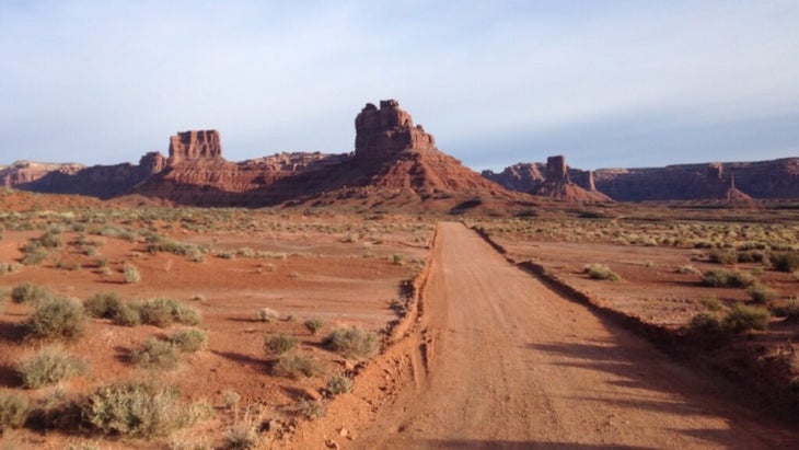 A remote road heads to massifs in Utah’s Valley of the Gods.