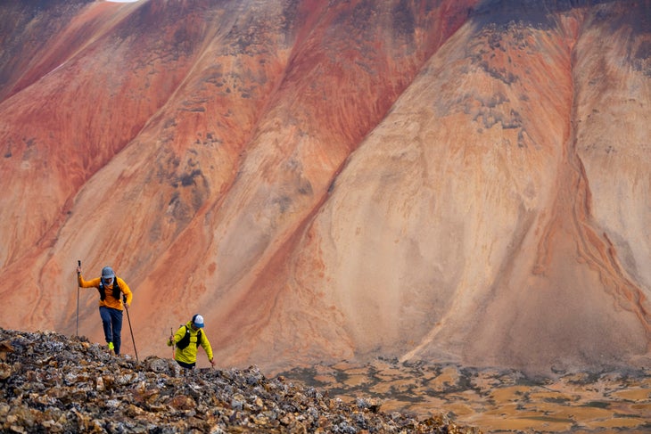 Hikers / trail runners in the Spectrum Range, Mount Edziza Provincial Park.