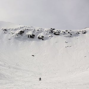 Skiers descend Tuckerman Ravine in New Hampshire