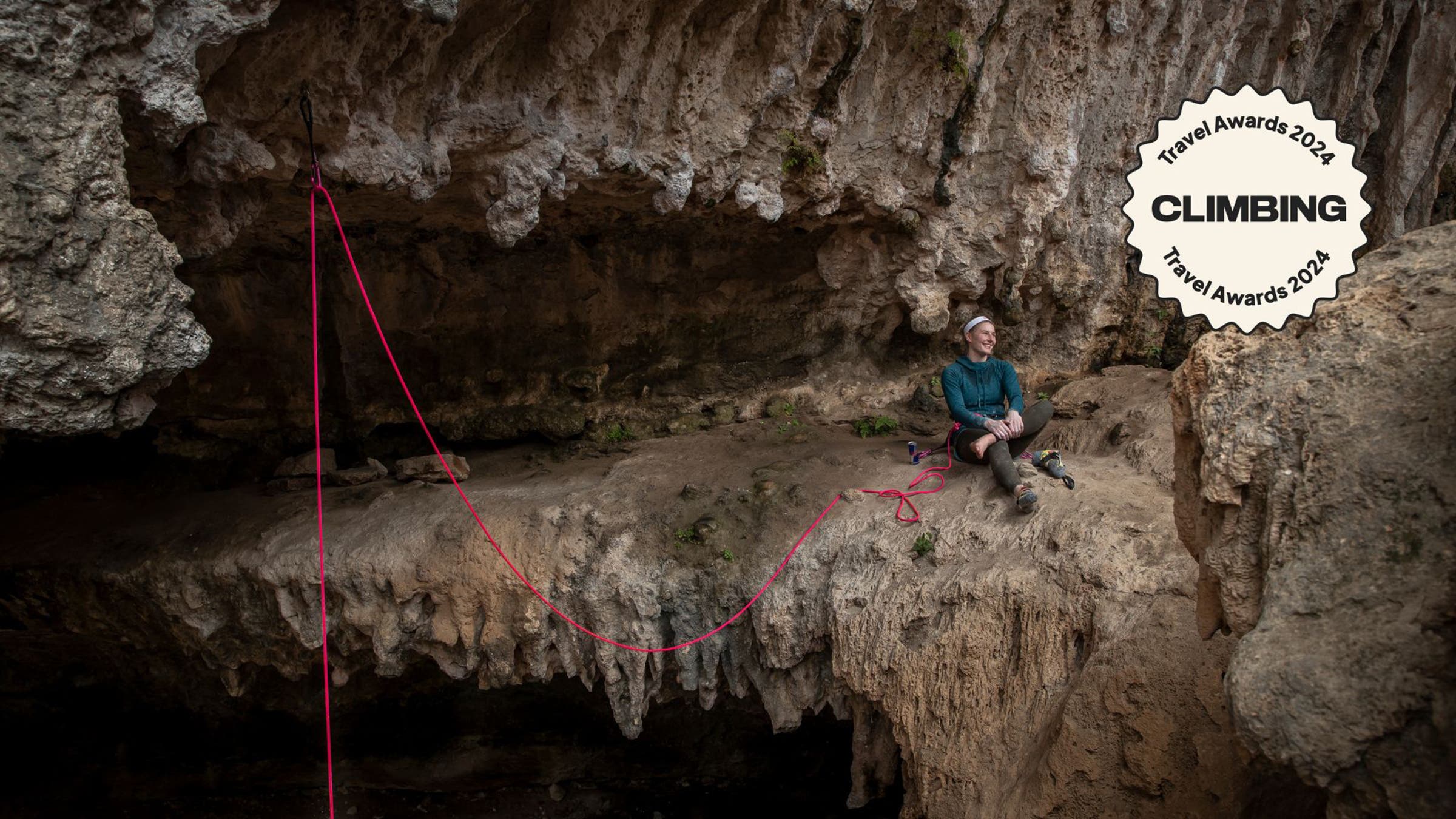 Climber perched on a rock