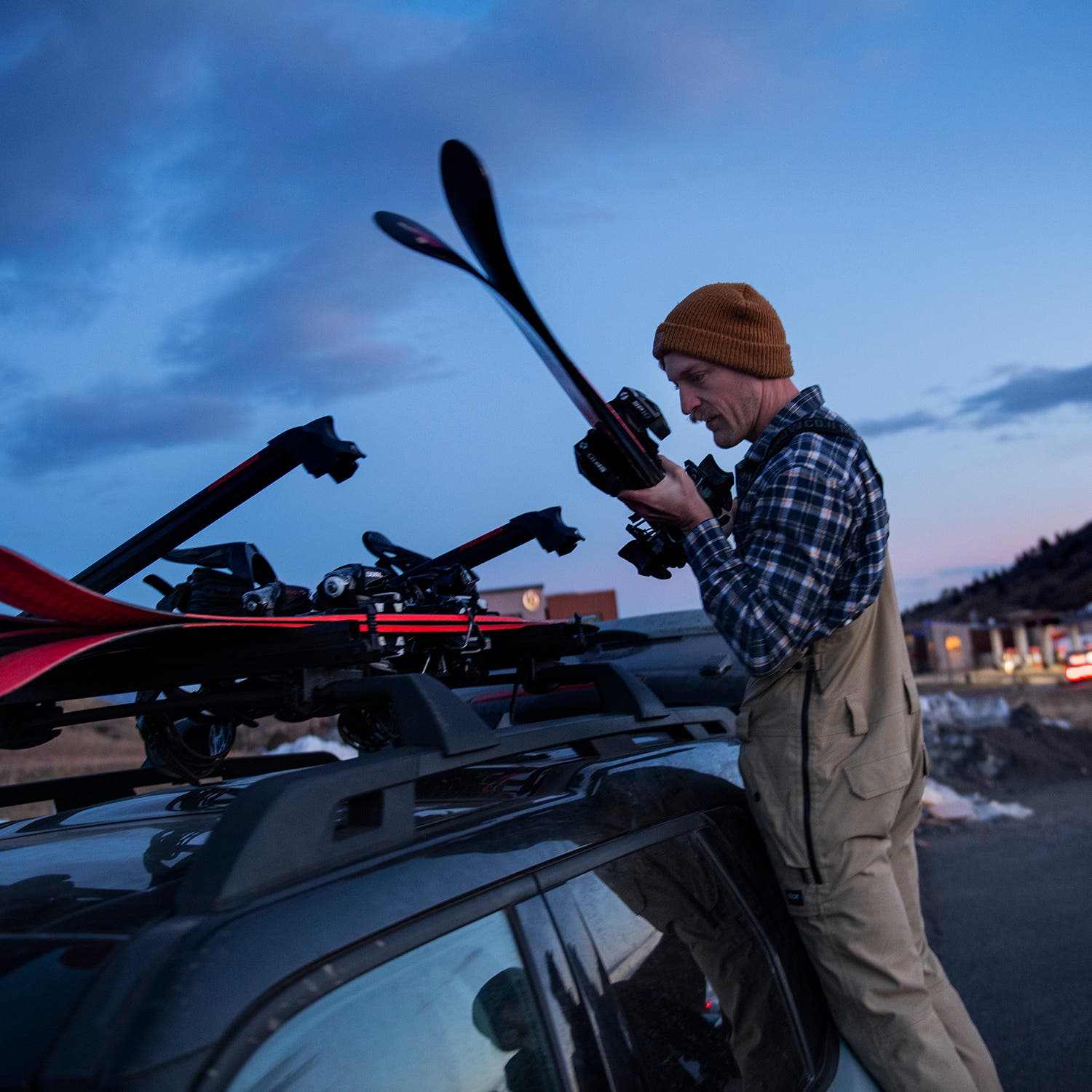 Also seen in the Dinosaur lots that same Saturday: Luke Ostrom, loading up his ski rack before driving to the mountains