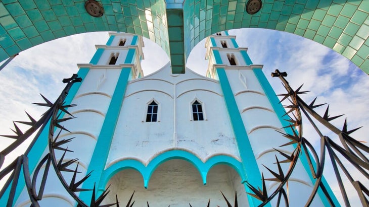 Colorful buildings and home in the historic center of Mazatlán, Mexico, include Cristo Rey Church.