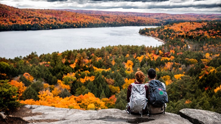 Young couple hiking and relaxing in Algonquin Park, Ontario, Canada