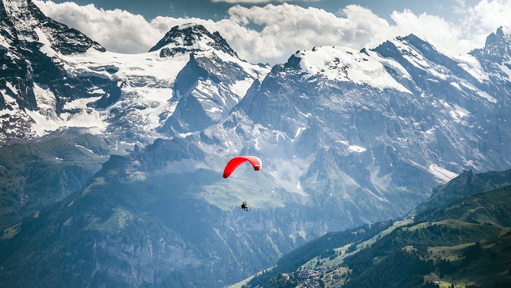 Paragliding over the Swiss Alps at Männlichen in Wengen