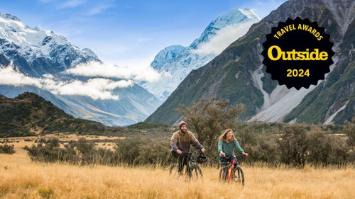 Two mountain bikers explore Aoraki/Mount Cook National Park, on New Zealand’s South Island.