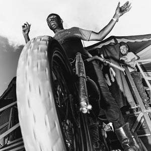 A rider known simply as Johnny Dare (left) and Robert “Rookie Bobby” Leverentz warm up the crowd at the beginning of the show.