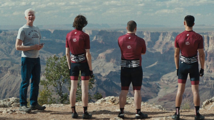 Matthew Modine and three actors stand on the edge of the Grand Canyon. 