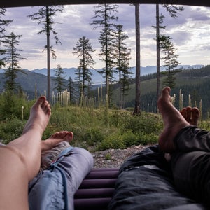 view from inside a car laying on a camping pad