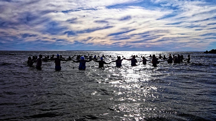 people on the Coney Island Polar Bear Club public community swim on New Year’s Day
