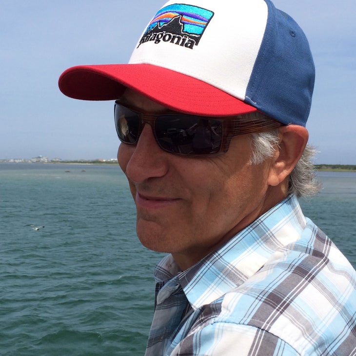 smiling man on a ferry heading to Ocracoke Island, North Carolina