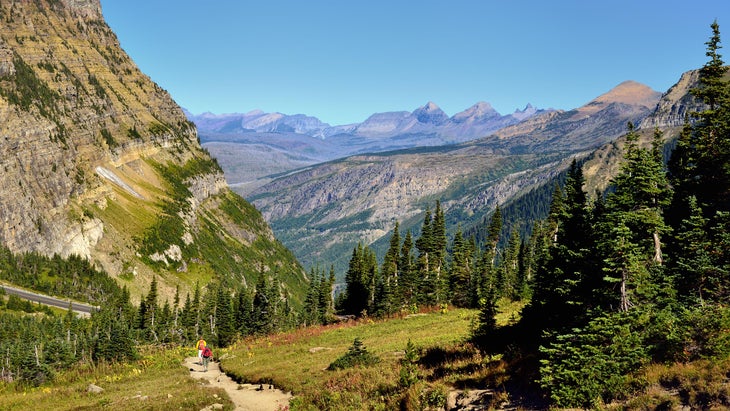 two people hiking in Glacier National Park