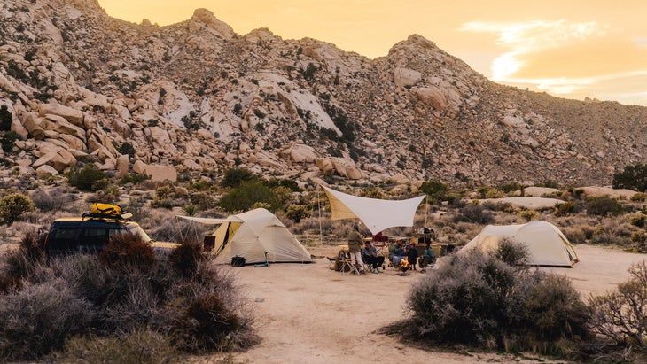 campsite blending into environment with Snow Peak tents and tarps