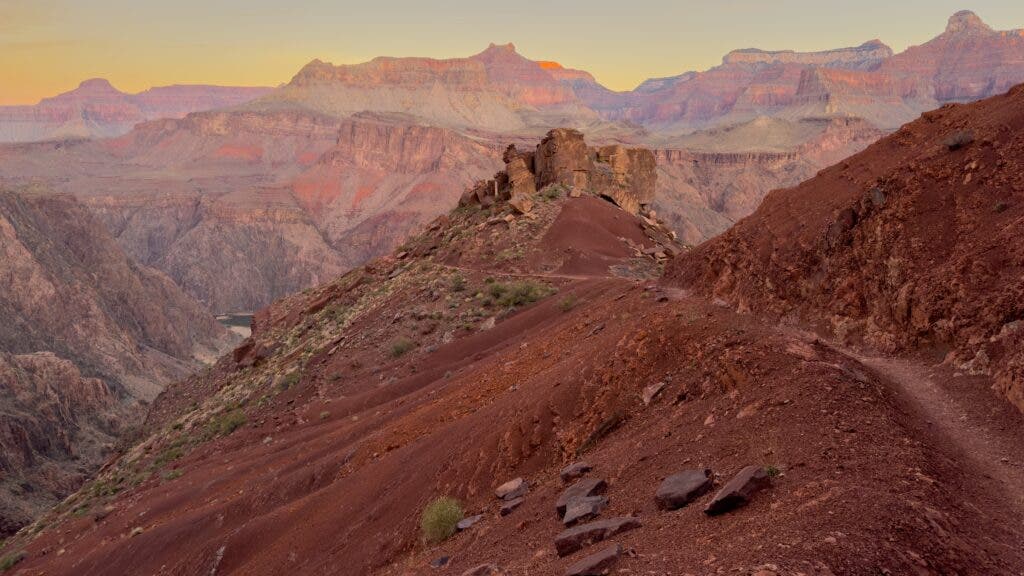 The South Kaibab Trail at dawn shows off the Grand Canyon’s varied colors of reds.