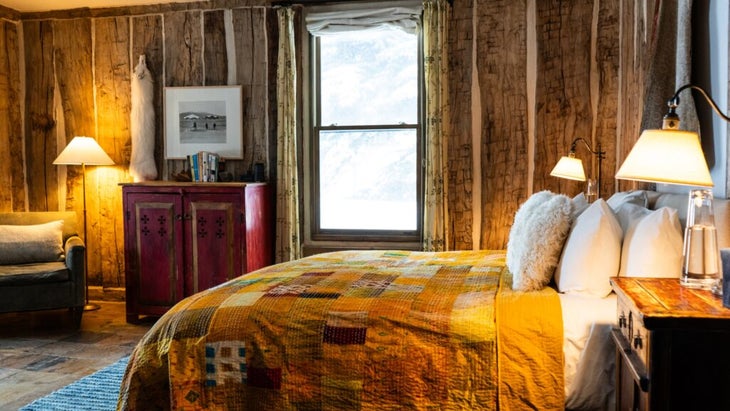The interiors of Vertical Log Cabin are cozy and roomy.