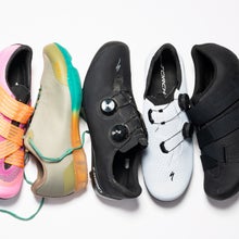 Various cycling shoes displayed on white background