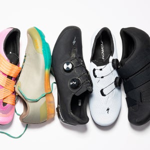 Colorful cycling shoes displayed on white background