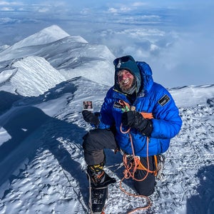 A belgian climber ascends Denali in snow.
